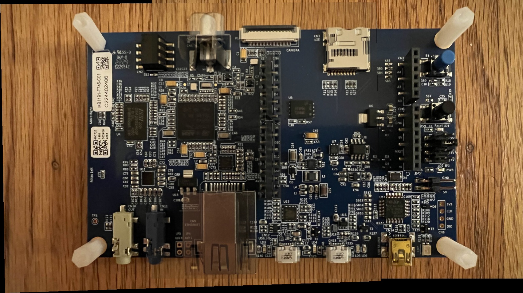 PCB close-up panorama, fine detail aligned across two views